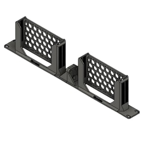 May include: A dark grey, elongated mounting bracket featuring two upright, rectangular holders with a hexagonal honeycomb pattern on the sides. The base includes screw holes at each end, and the text "Mountmaster" is embossed on the front.