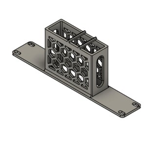 May include: A grey rectangular holder with a honeycomb lattice pattern on the sides and a flat base featuring mounting holes at each end. The top opening has two parallel bars across the centre, and the side panels include vertical oval cutouts.