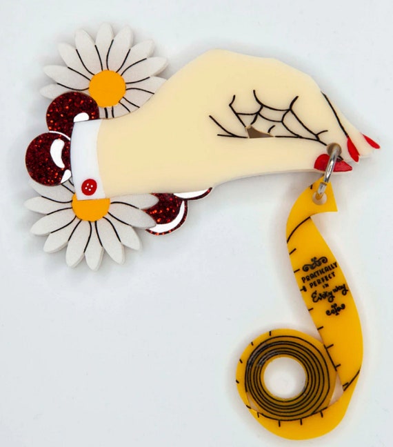 DAISY JEAN Mary Poppins Practically Perfect Hand with Measuring Tape Acrylic Brooch