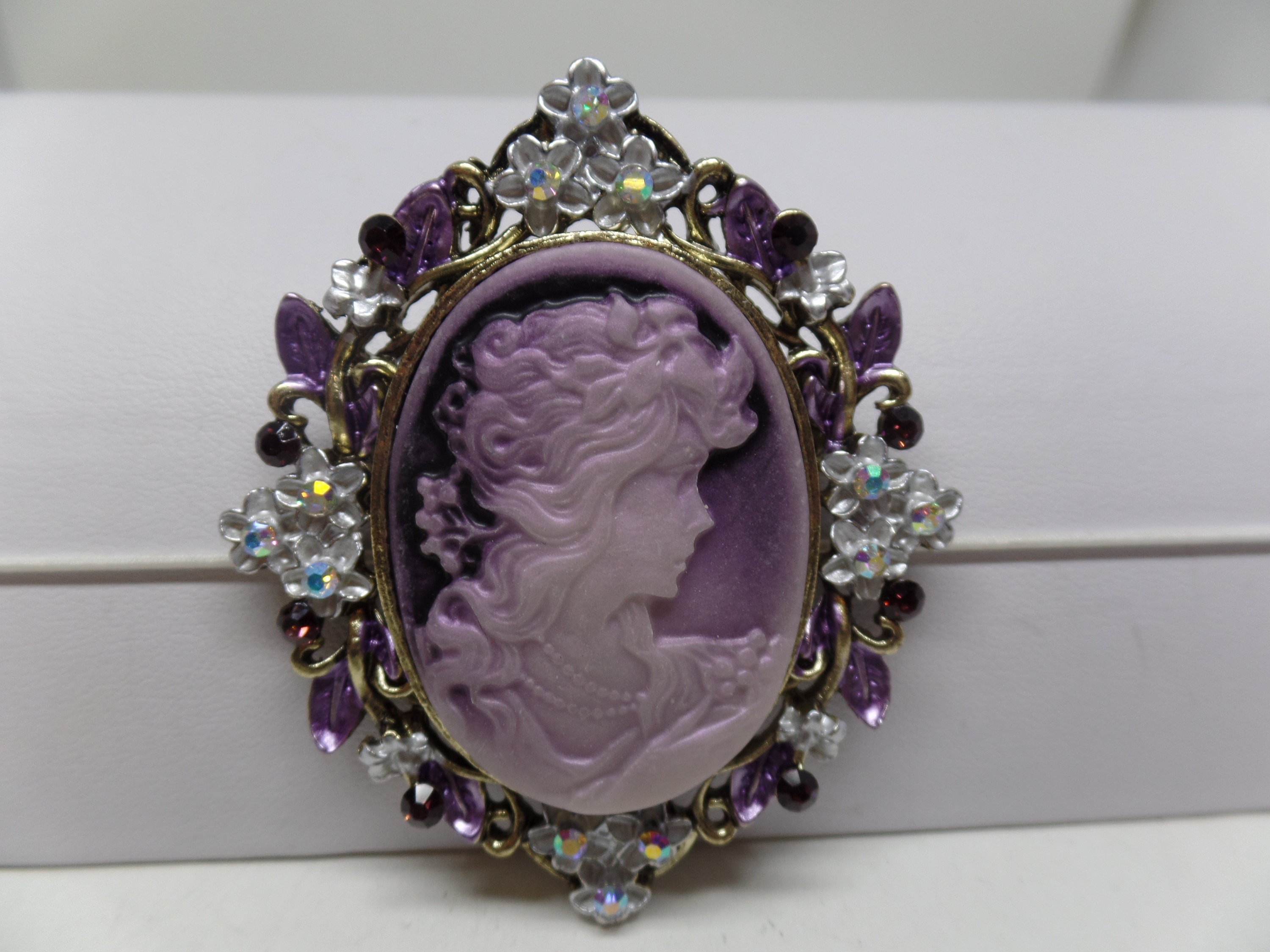 purple cameo brooch