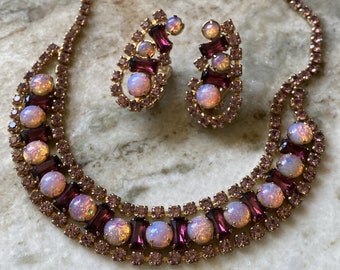 Vintage purple prong set rhinestone and faux pink opal necklace and clip on earrings set.