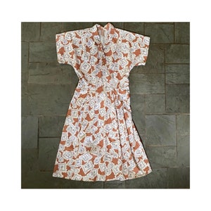 Vintage 1940s brown, blue and white cotton day dress, novelty print bows and flowers 40s vintage dress