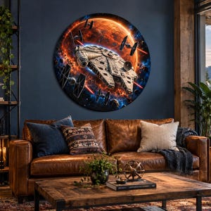 May include: A circular wall art piece depicting the Millennium Falcon in a space battle against TIE fighters. The scene features a glowing orange planet, dark blue nebula clouds, and red laser beams surrounding the detailed starship.