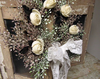 Luna leaf wreath with antique off white German millinery roses and embroidered lace ribbon , small brown and green leaves anita spero design