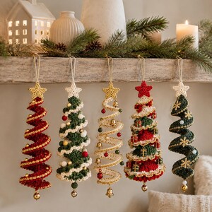 May include: Five spiral-shaped Christmas tree ornaments made of crocheted yarn. Each ornament features a star at the top and hangs from a string. The designs include red, green, and cream colors with small decorative beads, bells, and gift charms.