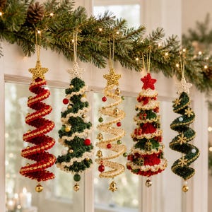 May include: Five spiral-shaped Christmas tree ornaments made of crocheted yarn, each topped with a star. The trees feature various colors including red, dark green, and cream, decorated with small bells, beads, and miniature gift boxes.