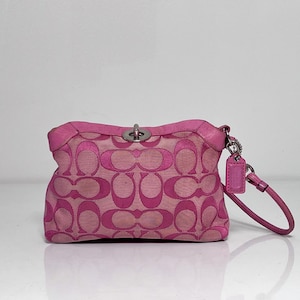 Coach Signature Turnrock mini Pouch