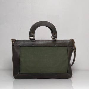 Bolso de mano unisex de lona y cuero verde militar de Davey's USA con asa superior y correa cruzada extraíble