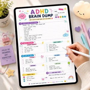 May include: A digital tablet displaying an ADHD Brain Dump planner template with colorful headings, sections for thoughts, tasks, and reminders, and handwritten text. The screen features a pink brain icon, a date field, and various decorative doodles like stars, hearts, and clouds.
