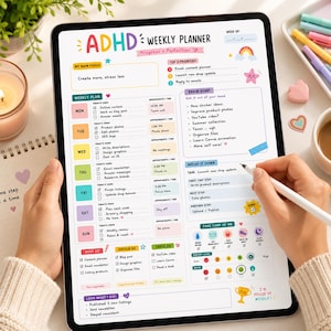 May include: A digital ADHD weekly planner displayed on a tablet screen, featuring colorful sections for daily tasks, top priorities, a brain dump area, and habit trackers. The layout includes headers like My Main Focus and Take Care of Me.