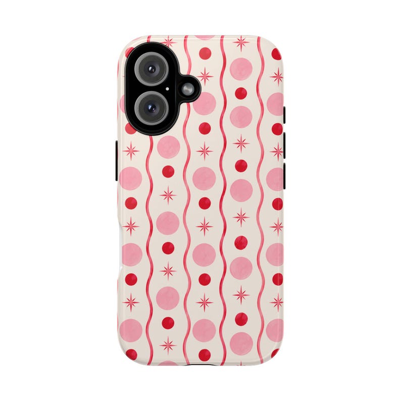 May include: A phone case with a cream-colored background featuring a repeating pattern of vertical wavy red lines, alternating light pink and dark red solid circles, and small four-pointed starburst shapes in a deep red color throughout the design.