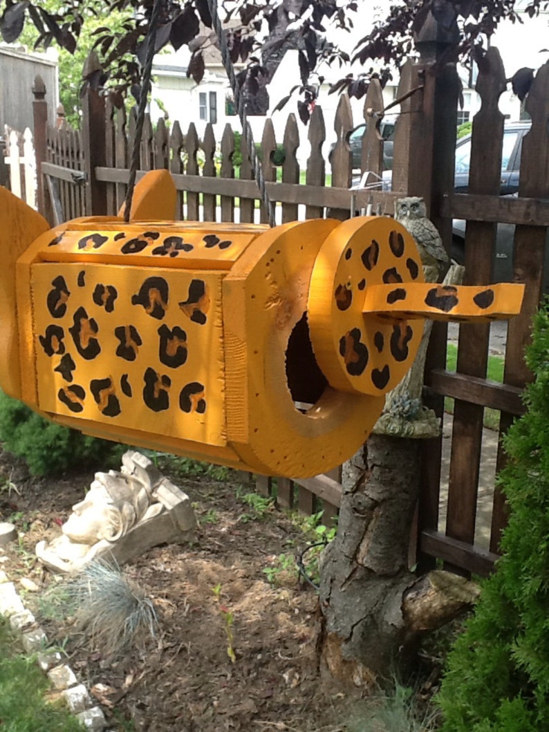 Leopard birdhouse image 4