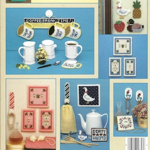 May include: A collection of cross-stitch patterns featuring various designs, including a coffee break theme, a goose, a pineapple, a duck, a strawberry, and a light switch. The patterns are printed on a white background with a blue border.