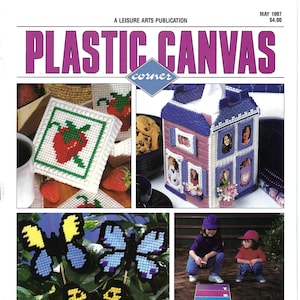 May include: A magazine cover for Plastic Canvas Corner, featuring 21 projects including a tooth fairy pouch, basket peeper, picturesque house, and hopscotch to go.
