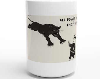 May include: A white ceramic mug featuring a black graphic illustration of a leaping panther and a cartoon figure in a uniform. The text "ALL POWER TO THE PEOPLE" is printed in black capital letters above the figure on a light beige background.