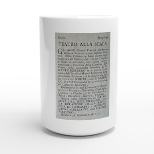 May include: A white ceramic mug featuring a rectangular black and white print of a historical document titled Teatro alla Scala, dated January 31, 1798. The text details theatrical performances and lists various actors and play titles in Italian.