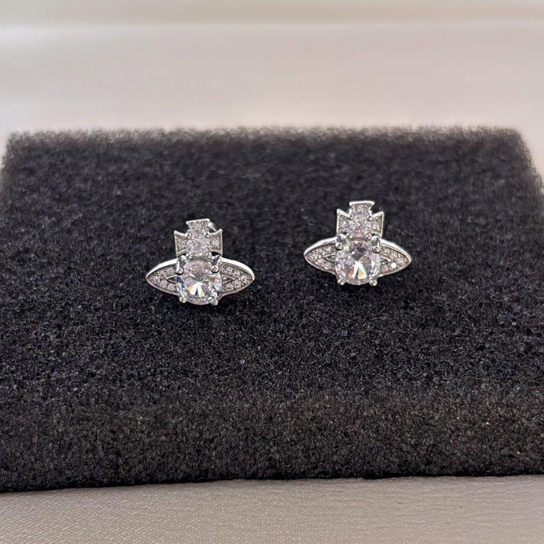 Vivienne westwood skeleton earrings - Etsy 日本