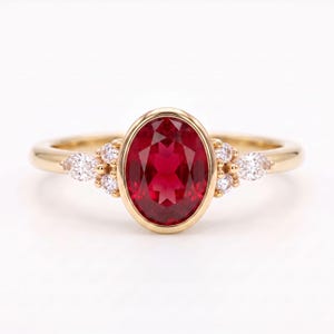 Oval Lab Ruby Ring: Bezel Set, Moissanite Cluster, 14K Gold, Minimalist Promise Ring