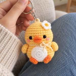 Crochet Duck Keychain Pattern: Mini Amigurumi Bag Charm Digital PDF, Yellow Duckling with Daisy, Bow and White Belly