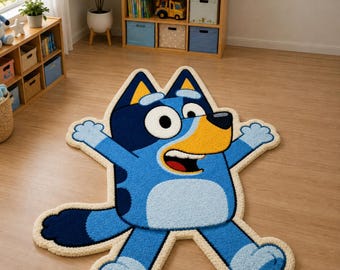 May include: A shaped area rug featuring a cartoon dog character with blue fur, a yellow snout, and a white belly. The rug has a thick cream-colored border and is designed in the likeness of a blue heeler dog with arms outstretched and a tail.