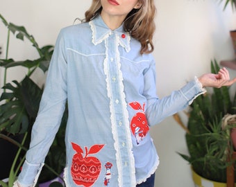 Vintage 1960s 70s xs button down apple + floral flower daisy Holly Hobbie long sleeve light blue chambray shirt