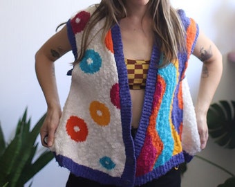 Vintage 1980s sleeveless sweater vest deep v-neck colorful geometric geo knit swirl