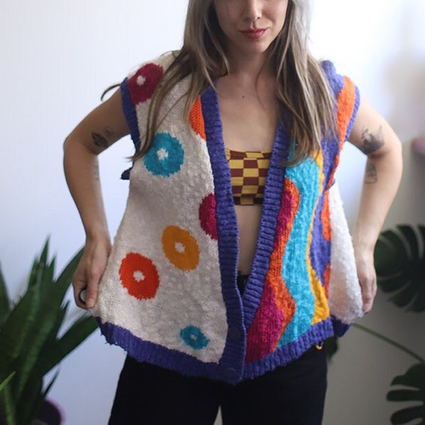 Vintage 1980s sleeveless sweater vest deep v-neck colorful geometric geo knit swirl