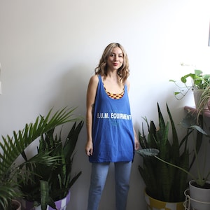 Vintage 1990s BUM b.u.m equipment sleeveless graphic tee t-shirt tank top
