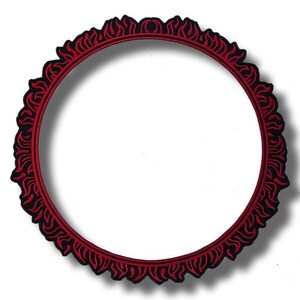 May include: A circular embroidered patch featuring a black centre and a decorative border composed of repeating red flame-like patterns. The outer edge of the patch follows the scalloped contour of the red flame design, creating a distinct circular shape.