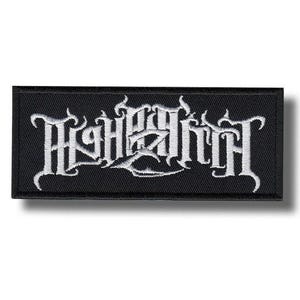 May include: A rectangular black embroidered patch featuring white stylised lettering that reads "HIGHFIRE" in a sharp, jagged font. The design is centred on a black fabric background with a stitched border, creating a high-contrast appearance.