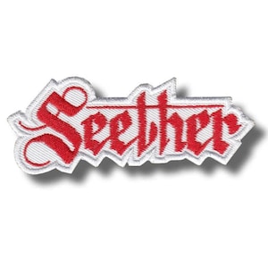May include: An embroidered patch featuring the word Seether in a stylised red gothic font. The lettering is outlined in white thread with a thick white border that follows the contour of the text, creating a distinct and bold visual appearance.