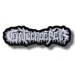 May include: An embroidered patch featuring the word Gatecreepers in a white, jagged, stylized font. The text is set against a black background with an irregular, organic border that follows the contour of the lettering, creating a high-contrast design.