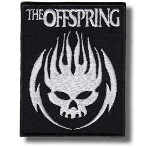 May include: A rectangular black embroidered patch featuring the white text THE OFFSPRING at the top. Below the text is a white embroidered graphic of a stylized skull with flame-like shapes extending upwards, all set against a black background.