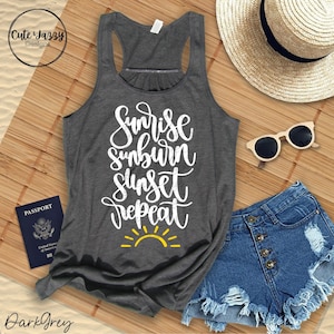 May include: Dark grey tank top with the text "Sunrise Sunburn Sunset Repeat" in white with a yellow sun graphic.