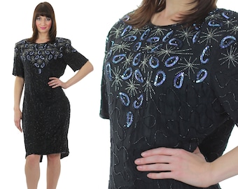 Vestido de fiesta corto, abstracto, negro, de mal gusto, de los años 80. Talla mediana.