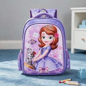 May include: A purple backpack featuring a glossy front panel with an illustration of Sofia the First and a rabbit holding flowers. The bag includes a top handle, padded shoulder straps, side mesh pockets, and a zipper closure with a bow graphic.