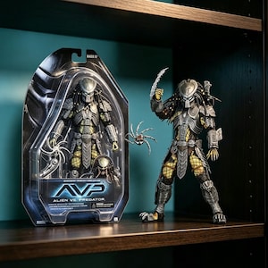 May include: An Alien vs. Predator action figure in its original blister packaging alongside an identical loose figure. The Predator figure features metallic silver armor, a textured yellow and black body suit, dreadlocks, and a raised bladed weapon.