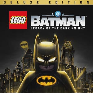 May include: A LEGO Batman Legacy of the Dark Knight Deluxe Edition cover art featuring a black LEGO Batman figure with a glowing yellow chest emblem against a dark, detailed city skyline with a bat signal in the sky and the DC logo above.