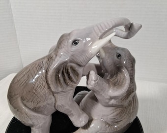Ceramic Porcelain Elephant Figurine – Playful Two-Elephant Sculpture