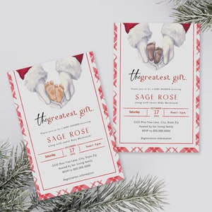 May include: A red and white plaid baby shower invitation with a watercolor illustration of Santa Claus's hands holding a pair of baby feet. The text reads "The greatest gift." and "Sage Rose".