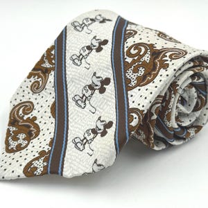 Vintage 1970s Wide White Polyester Tie with Blue and Brown Mickey Mouse Paisley Patterned Stripes