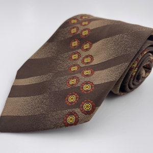 Vintage 1970s Wide Brown all Polyester Tie with Red and Yellow Patterned Stripe by Mr. John by Beau Brummell from McAlpin’s