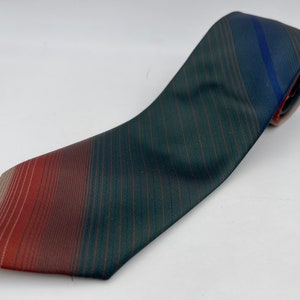Vintage 1980s Skinny Green Polyester Tie with Rust and Beige Diagonal Stripes from JC Penney