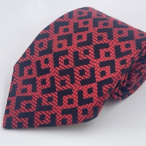 Vintage 1970s Wide Red Polyester Tie with Black Geometric Pattern
