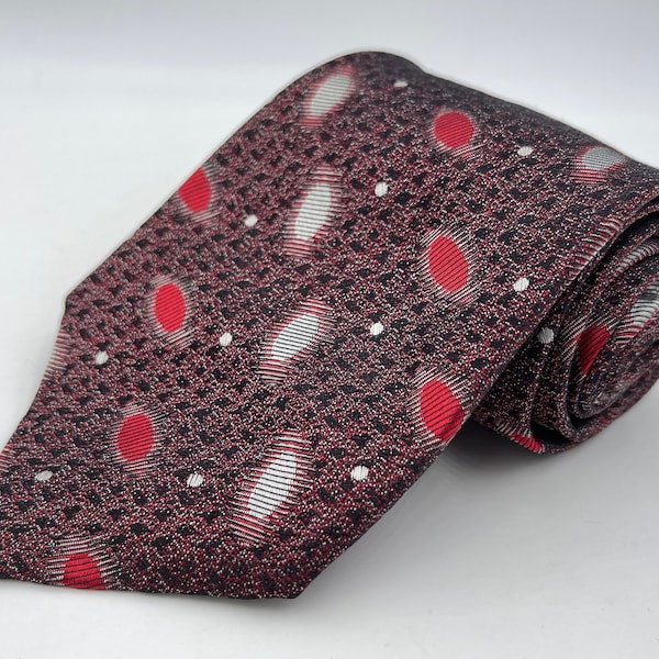 Vintage 1980s Black Silk Tie with Bronze Atomic Pattern with Red and Silver Oval Neats by Serica from Jacobsens of Tampa