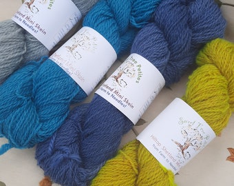 The Mini Skein Morning Sky Fingering Yarn Collection in hand dyed colors