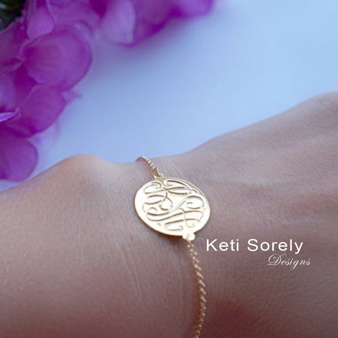 Personalized round locket bracelet with hand engraved monogram initials in  Sterling Silver, yellow Gold or Rose Gold