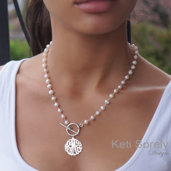 Pearl necklace with monogram pendant discount