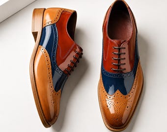 Handgjorda trefärgade oxfordskor i läder, marinblå vinröda vingspetsbrogues