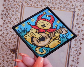 Sad Jester Cat - Woven Iron-On Patch